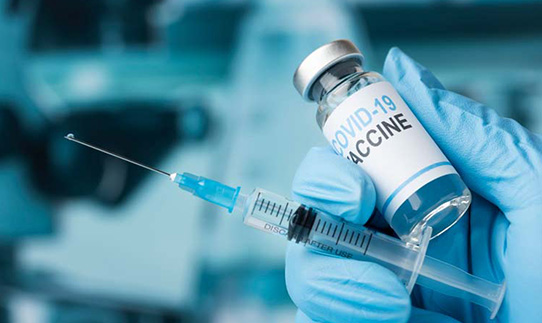 a covid-19 vaccine vial with a syringe-book free Covid-19 booster with fitzroy north doctors-mixed-bulk-bill clinic melbourne